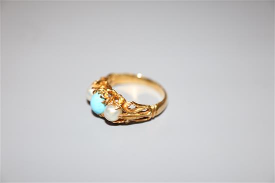 A Victorian style yellow metal turquoise and cultured pearl three stone ring, size H, gross 4.7 grams.